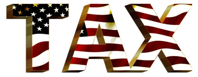 Composite image of the word “Tax” written with the American flag juxtaposed inside the text.