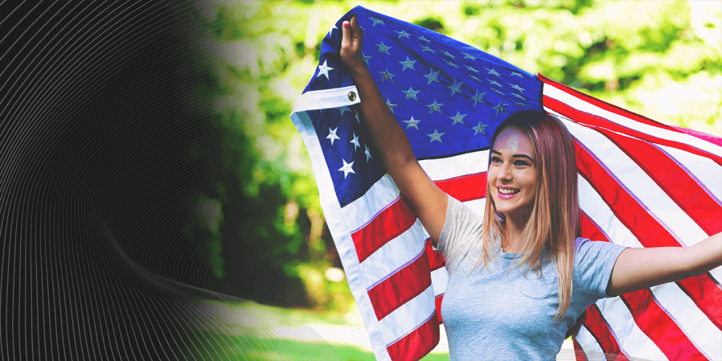 woman holding the American Flag