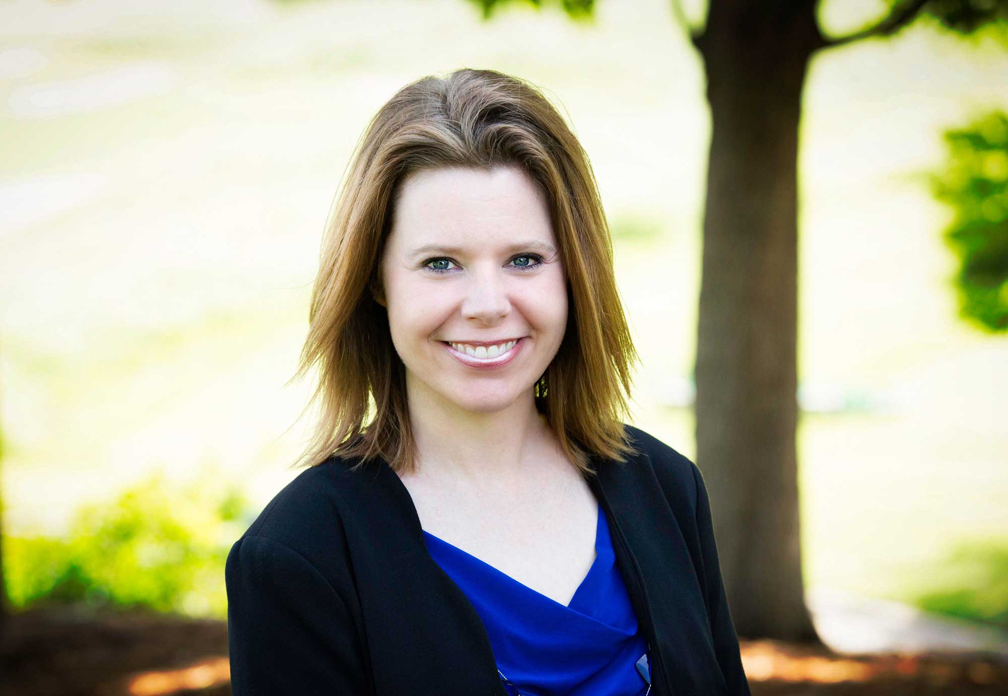 Outdoors headshot of Mary Minson