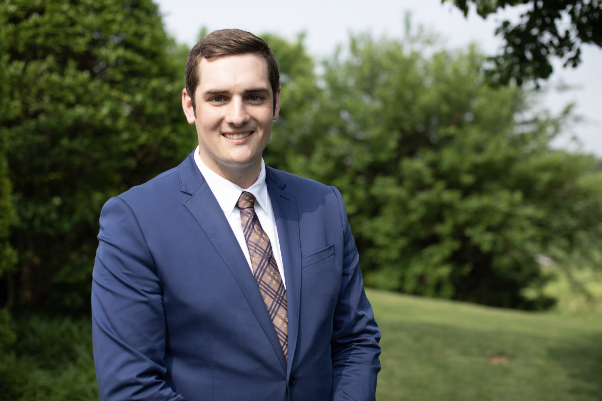 Outdoors headshot of Ryan Milam