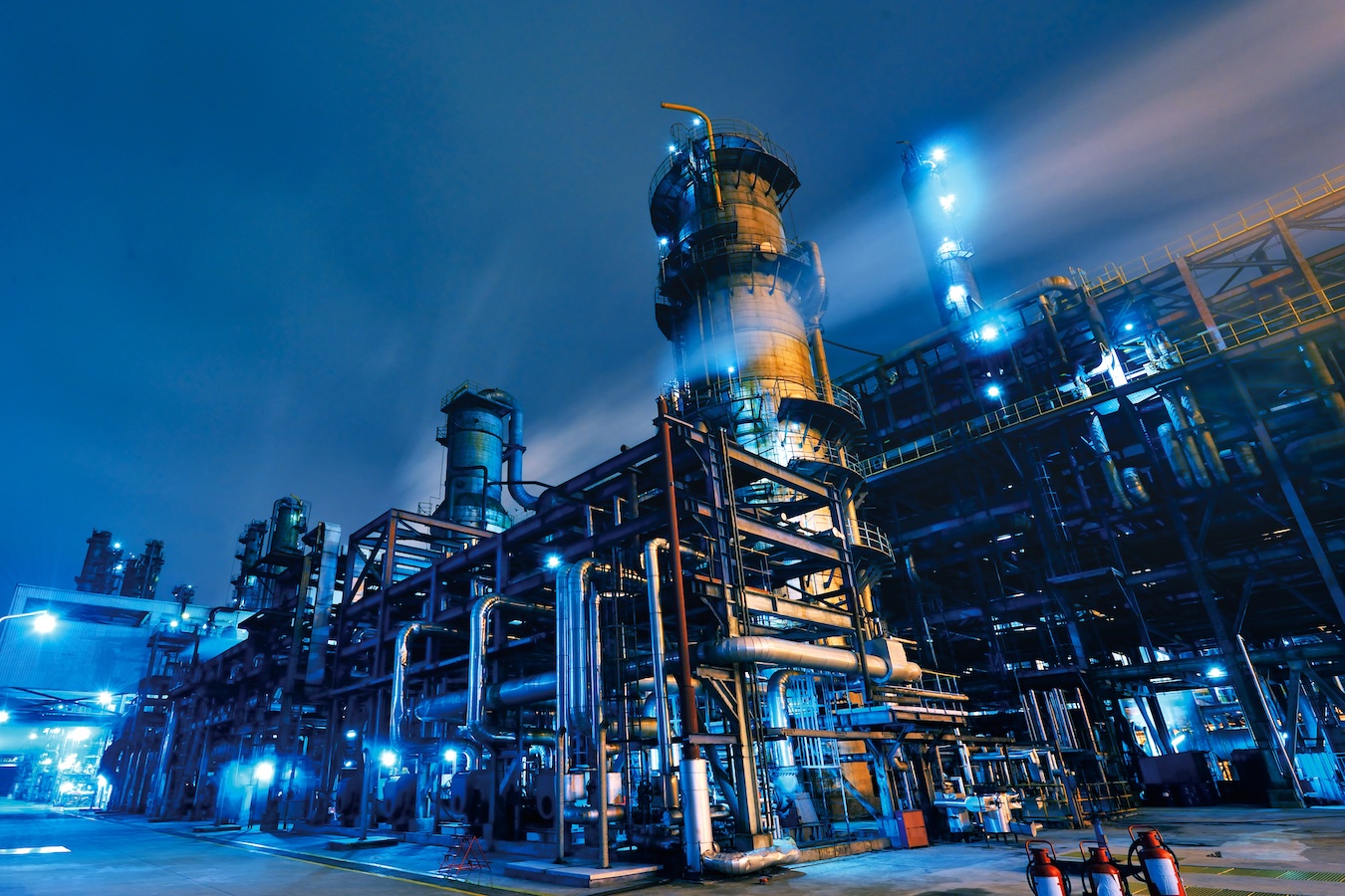 Oil Refinery, Chemical & Petrochemical plant abstract at night.