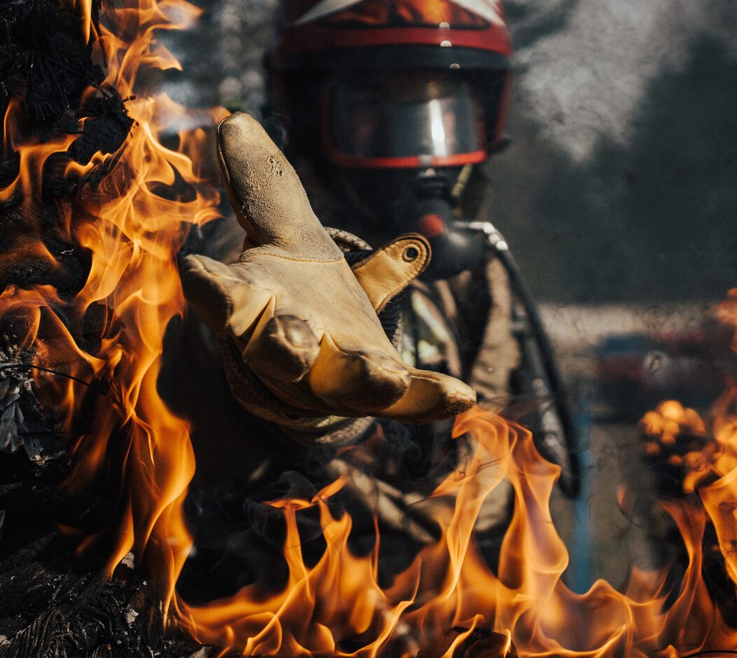 firefighter reaching out his hand