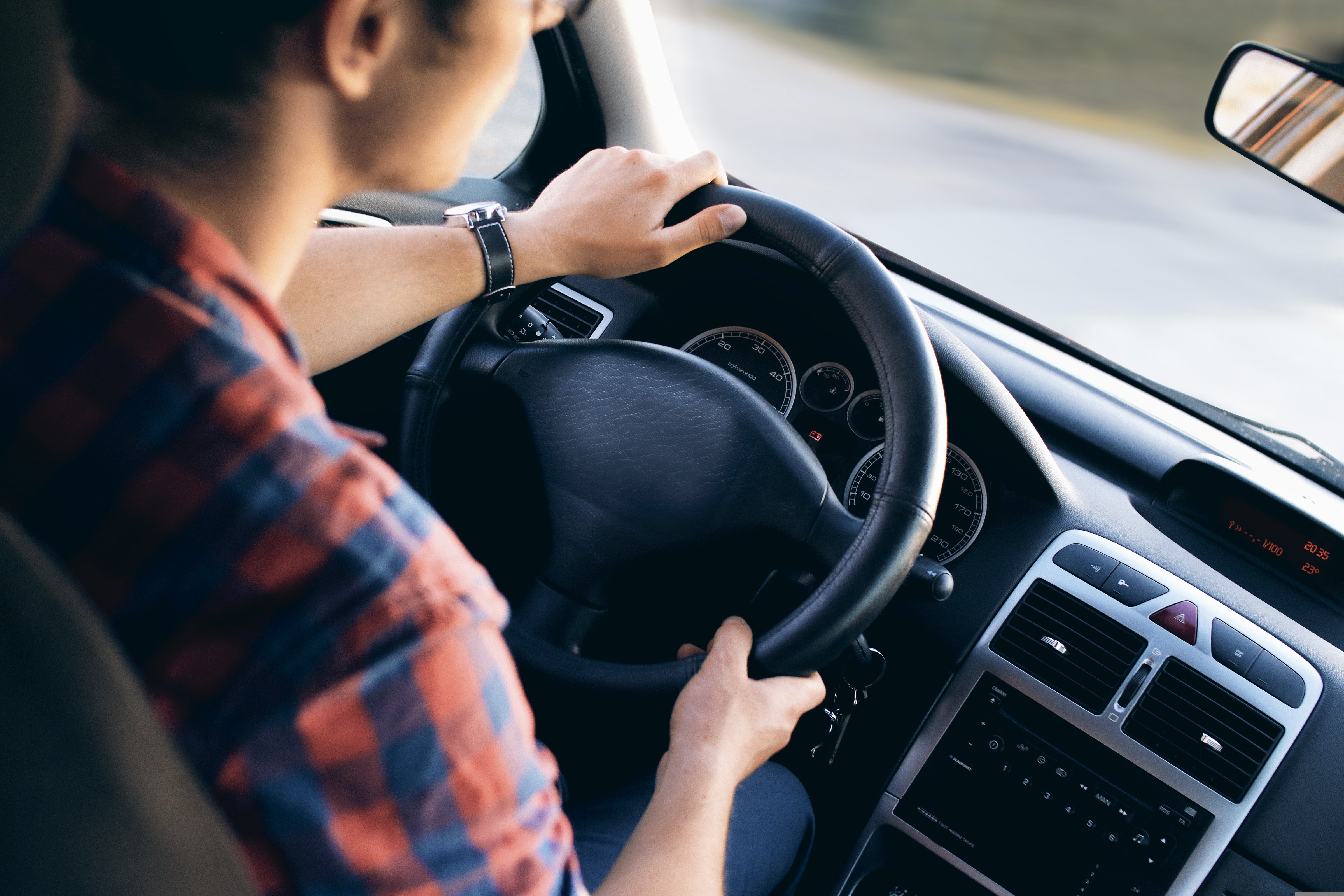 man driving vehicle